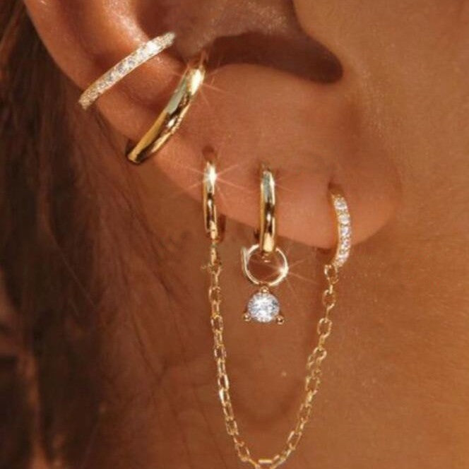 Damen Ohrstecker-Set mit eleganten Spiralen und funkelnden Akzenten Shop Nory