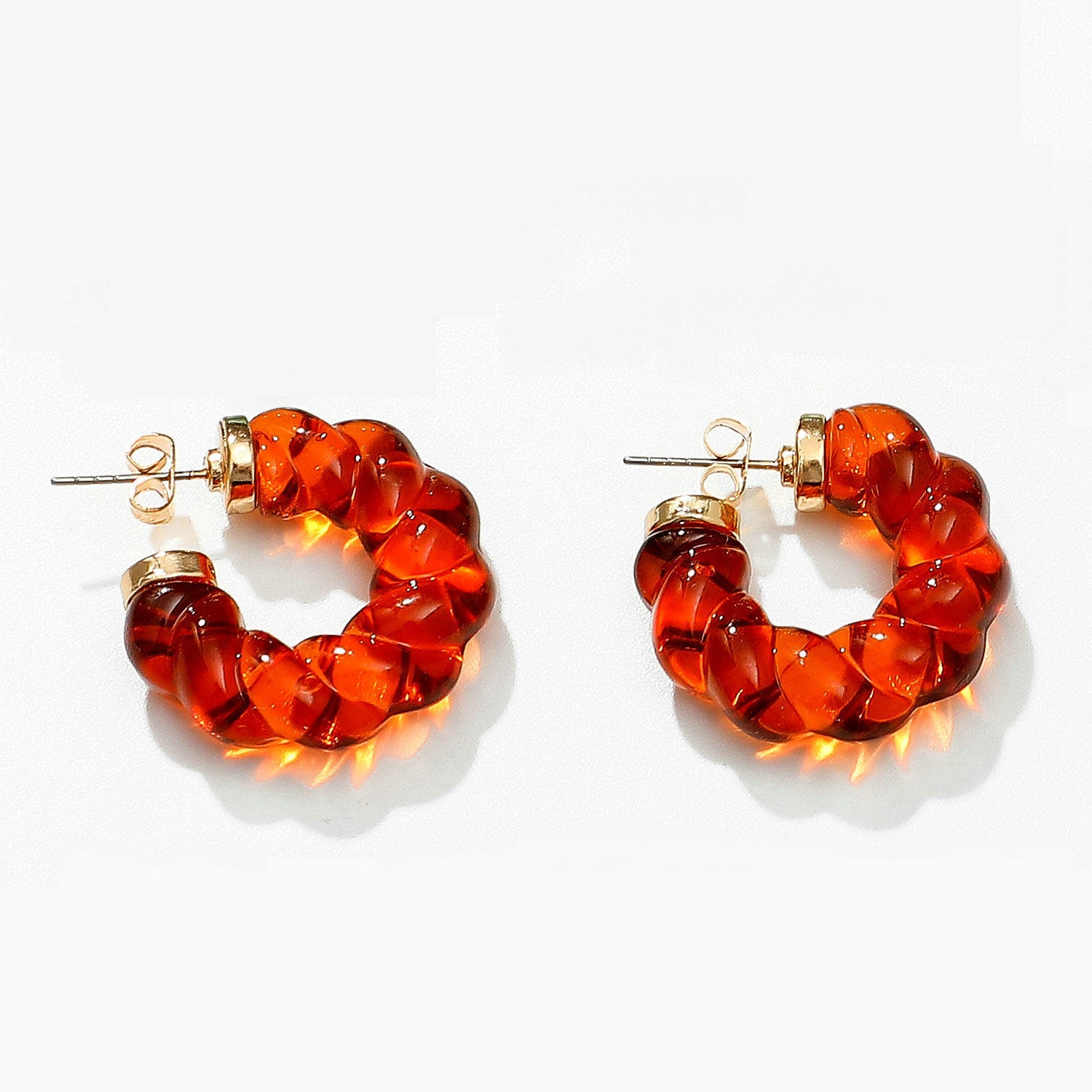 Damen Creolen aus leuchtendem Kunstharz mit elegantem Twist-Design Shop Nory