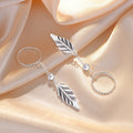 Damen Hängende Ohrringe mit filigranem Blattdesign und eleganten Akzenten Shop Nory