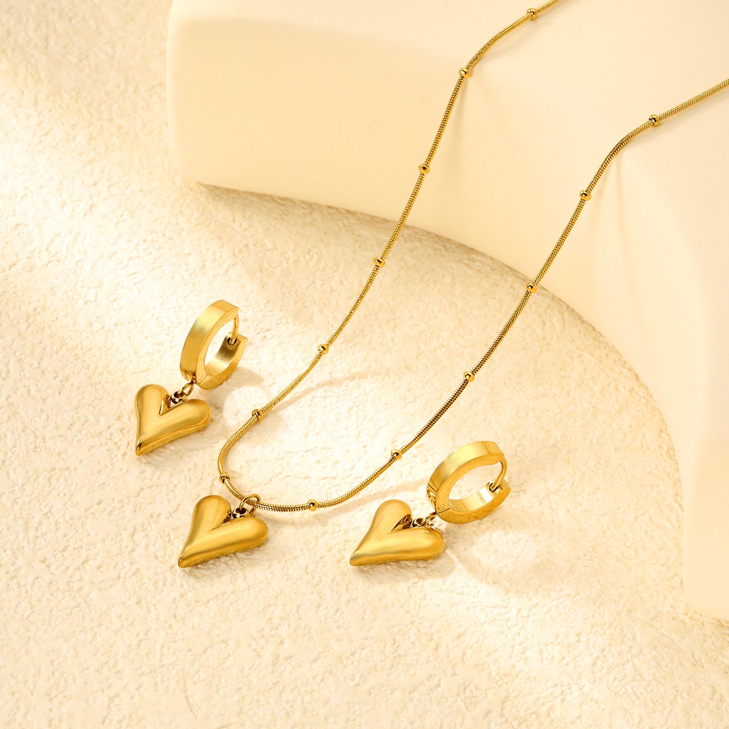 Damen Schmuckset mit vierblättrigem Kleeblatt-Anhänger und passenden Ohrsteckern Shop Nory