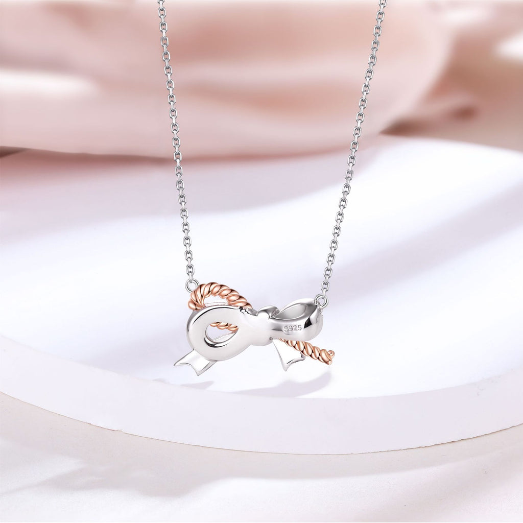 Damen Halskette mit elegantem Schleifenmotiv und funkelndem Zirkonia-Besatz Shop Nory