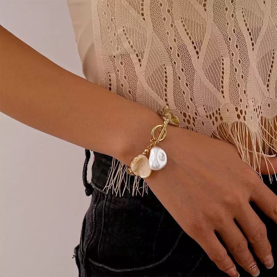 Damen Schmuckset aus einzigartigen Muschelhelen und edlem Goldverschluss Shop Nory