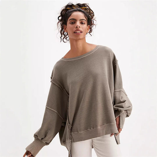 Damen oversized Sweatshirt mit Ballonärmeln, offenen Saumnähten und seitlichen Schlitzen Shop Nory