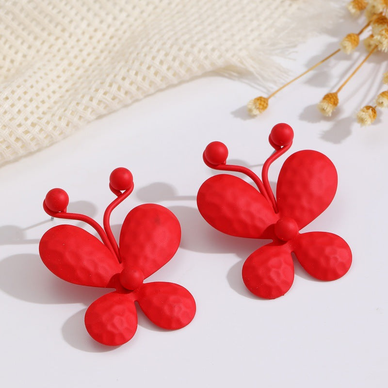 Damen Ohrclips mit kunstvollem Blumenmuster Shop Nory