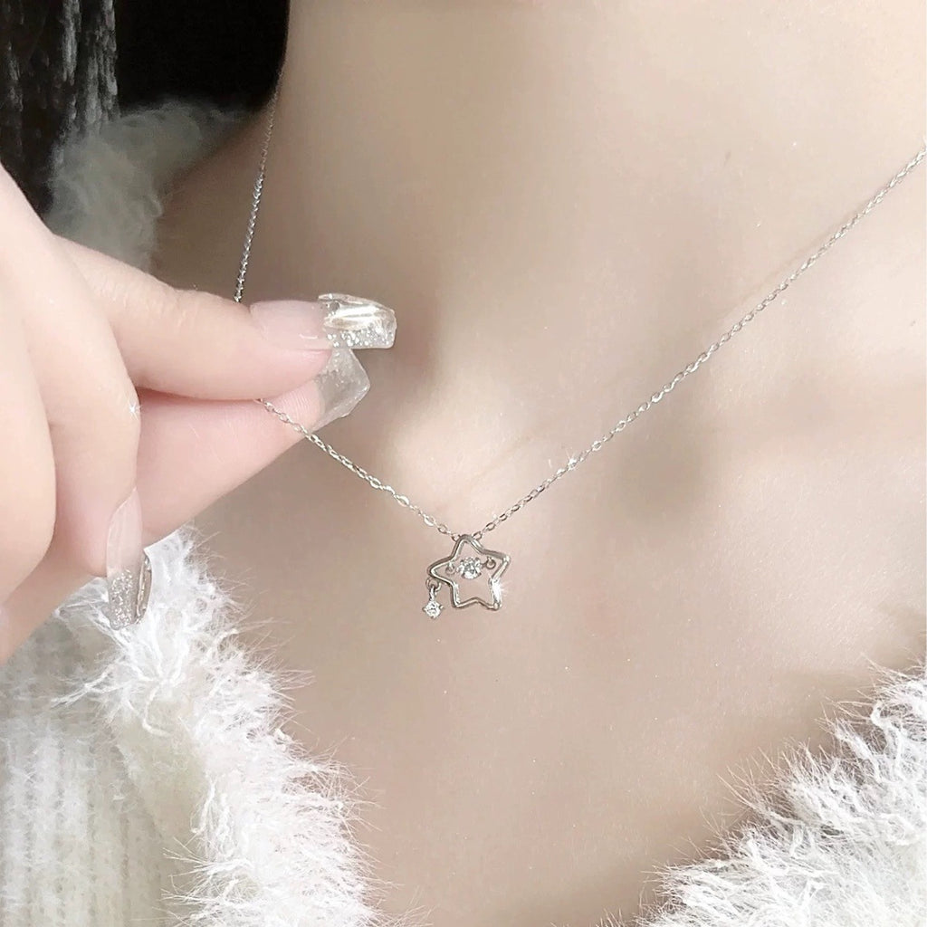 Damen Halskette mit funkelndem Sternenanhänger und zarten Details Shop Nory