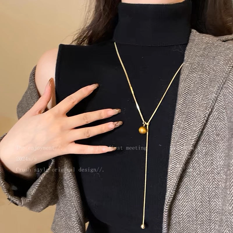 Damen Halskette mit einem einzigartigen Tigeraugen-Anhänger und glänzendem Gold-Design Shop Nory