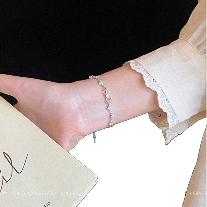 Damen elegantes Zirkonia-Armband mit kunstvollem Design und verstellbarem Verschluss Shop Nory