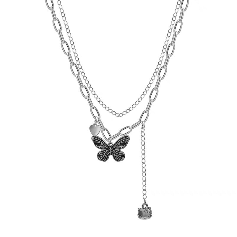 Damen Kette mit kunstvollem Schmetterlings- und Herzanänger Shop Nory