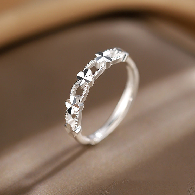 Damen Zierlicher Ring mit floralem Design und funkelnden Akzenten Shop Nory