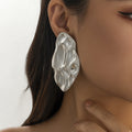 Damen extravagante Ohrringe aus hochwertigem Metall mit organischem Design