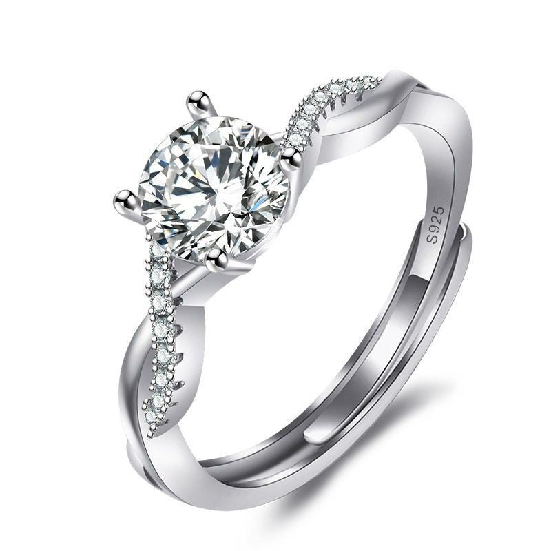 Damen eleganter Ring mit funkelndem Solitär und verspieltem Zirkonia-Besatz Shop Nory