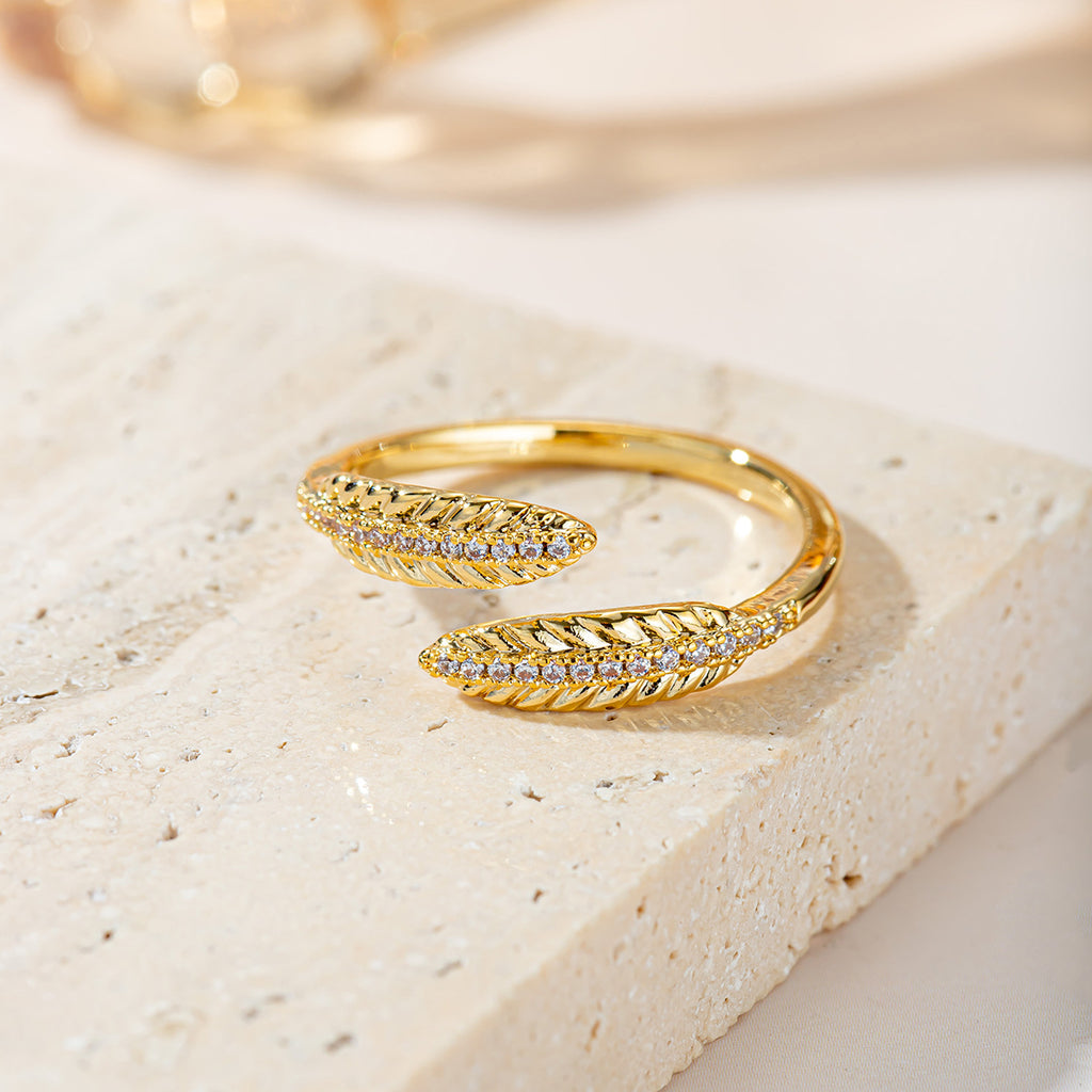 Damenarmreif mit floralem Design und funkelnden Kristallen Shop Nory