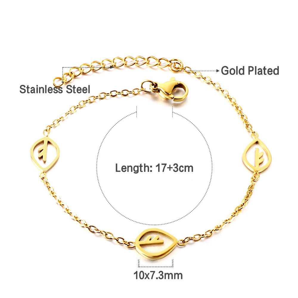 Damen Armband mit feinen Blattmotiven aus Edelstahl und goldplattierter Oberfläche Shop Nory