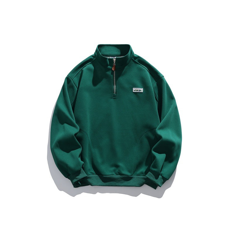 Unisex Halbzip-Sweatshirt mit Stehkragen, Raglanärmeln und minimalistischer Brustpatch Shop Nory