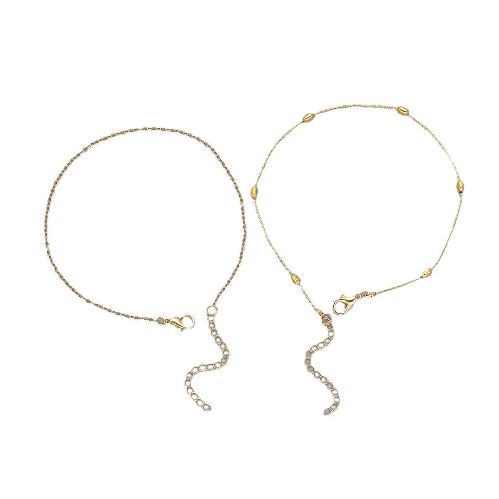 Damen Fußkettchen mit silbernem Herz-Detail und zarten Perlen Shop Nory