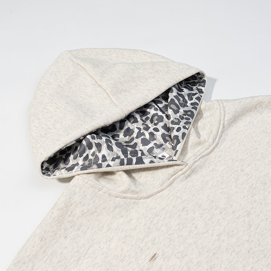 Damen Oversize‑Kapuzenpullover mit Leo‑Futter, Used‑Details und Kängurutasche Shop Nory