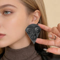 Damen Ohrringe mit kunstvollem Gesichtsdesign Shop Nory