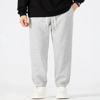 Herren Locker geschnittene Fleece-Jogginghose mit Kordelzugbund und elastischen Beinabschlüssen Shop Nory