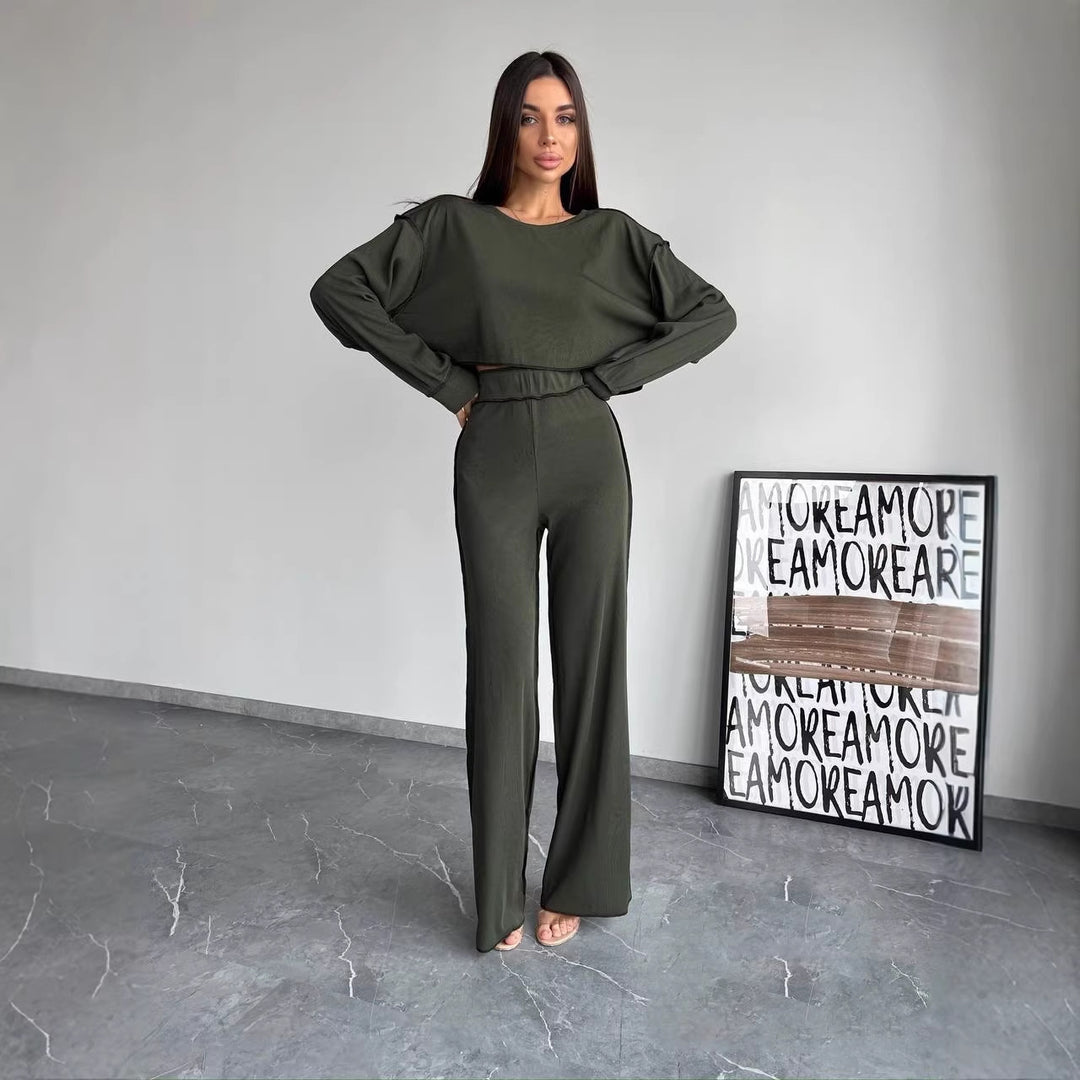 Damen Cropped Oversized-Sweatshirt mit Overlocknähten und High-Waist ausgestellter Hose Set Shop Nory