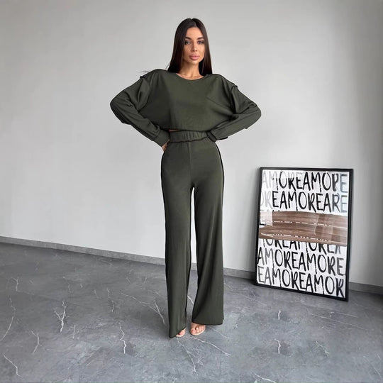 Damen Cropped Oversized-Sweatshirt mit Overlocknähten und High-Waist ausgestellter Hose Set Shop Nory