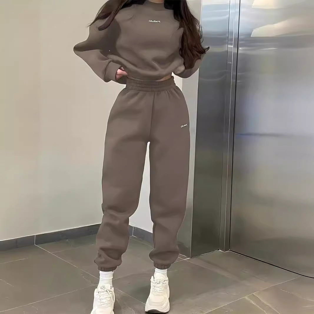 Damen hochgeschnittene Jogginghose mit elastischem Rüschenbund, tapered Bein und gerippten Knöchelbündchen Shop Nory