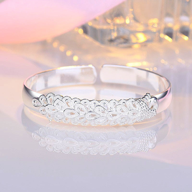 Damen Armreif mit aufwendigem Blattdesign und funkelnden Zirkonia Shop Nory
