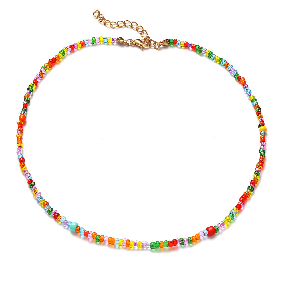 Damen Halskette mit bunten Blumenelementen und eleganten Perlen Shop Nory