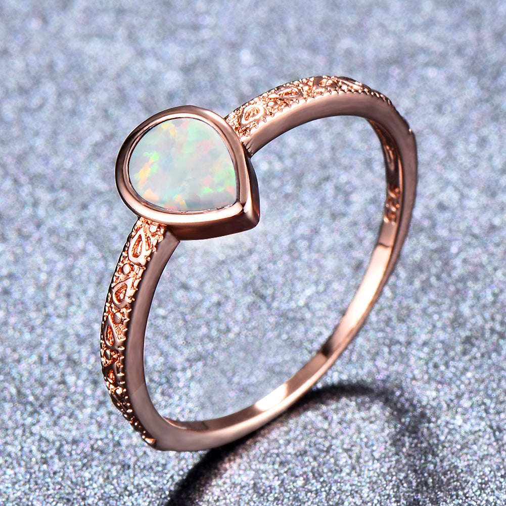 Damen Ring mit tropfenförmigem Opal und filigraner Zirkonia-Verzierung Shop Nory