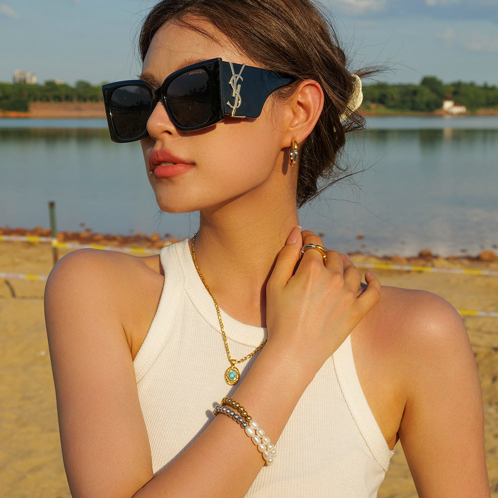 Damen elastisches Perlenarmband mit Edelstahl-Elementen Shop Nory