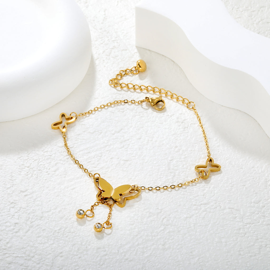 Damen zartes Armband mit Schmetterlingsanhängern und funkelnden Kristallen Shop Nory