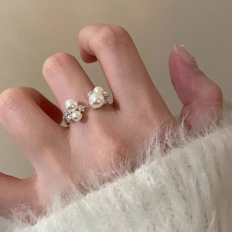 Damenring mit eleganten Perlen und funkelnden Zirkonia-Details Shop Nory