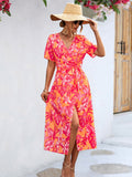 Damen Wickelkleid im floralen Design mit eleganten Rüschendetails