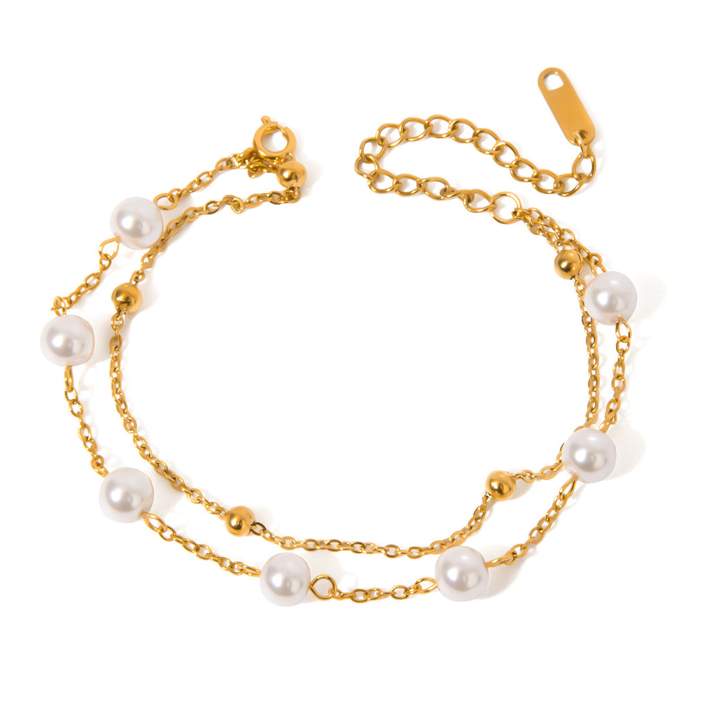 Damen Armband mit elegantem Perlen- und Goldakzent Design Shop Nory