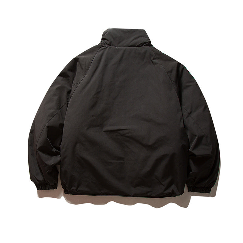 Unisex Boxy Wattierte Übergangsjacke mit hohem Stehkragen, elastischen Bündchen und aufgesetzten Klappentaschen Shop Nory
