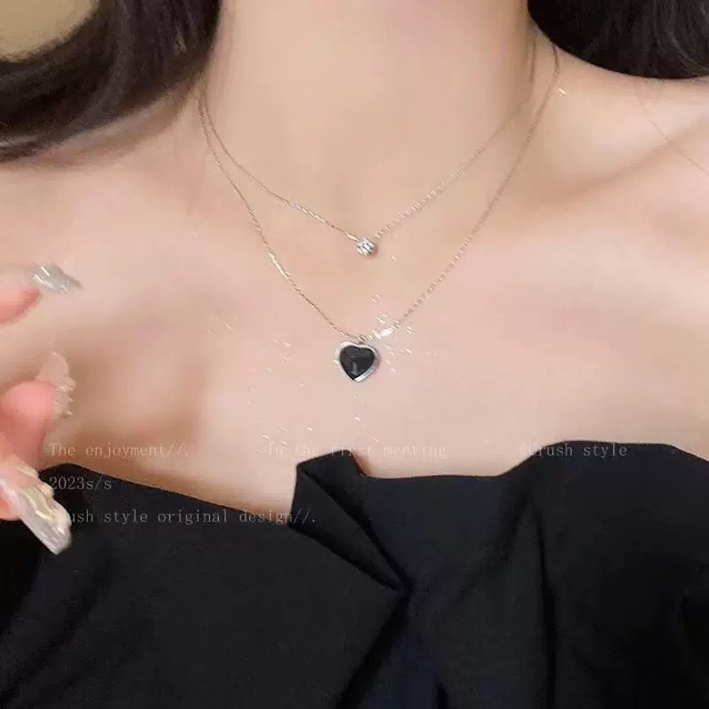 Damen mehrlagige Halskette mit herzförmigem Anhänger und funkelnden Details Shop Nory