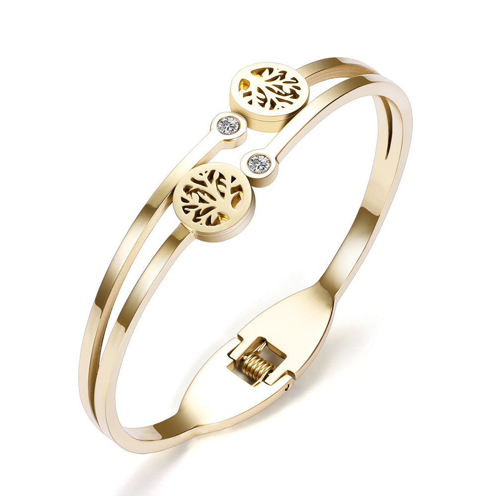 Damen Armband mit feinem Baum-Motiv und funkelnden Zirkonia Shop Nory