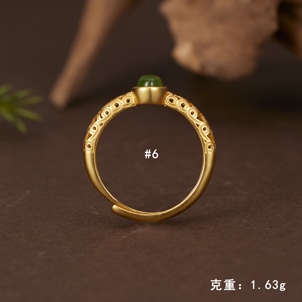 Damen eleganter Ring mit kunstvollem Design und grünem Halbedelstein Shop Nory