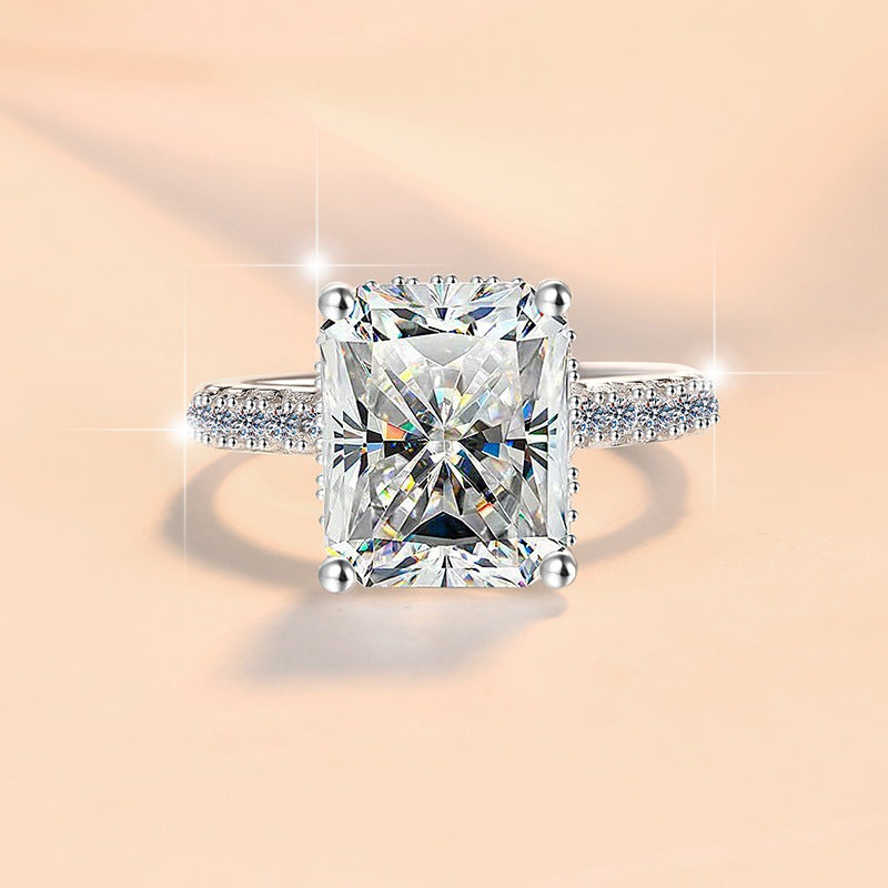 Damen Verlobungsring mit kunstvollem Zirkonia und elegantem Rahmen Shop Nory