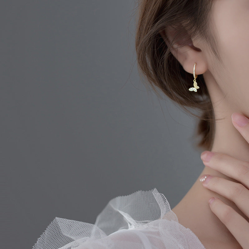 Damen Ohrhänger mit elegantem Schmetterlingsdesign und funkelnden Details Shop Nory