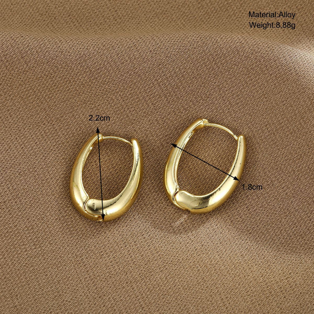 Damen Ohrringe mit modernem, geschwungenem Design Shop Nory