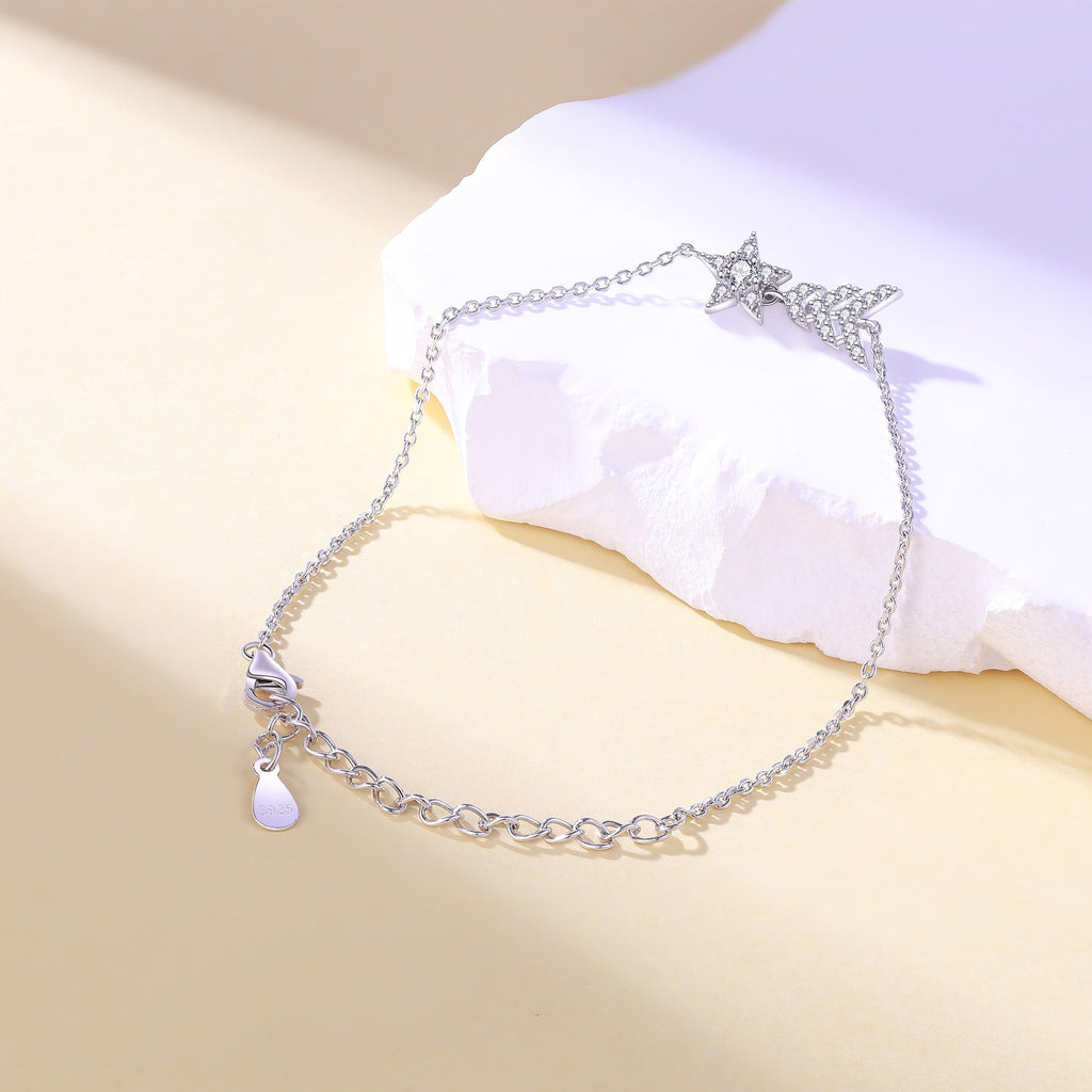 Damenarmband mit funkelnden Stern- und Blattmotiven Shop Nory