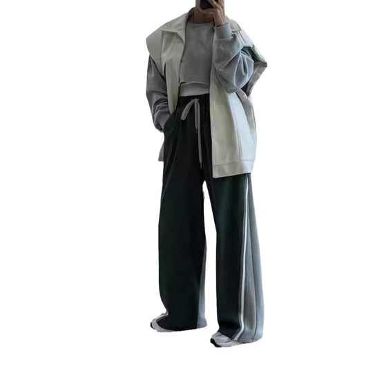 Unisex weite zweifarbige Jogginghose mit Seitenstreifen und Tunnelzug Shop Nory