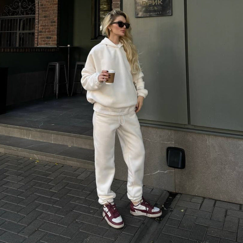 Damen kuscheliges Sweat-Set mit extralangem Kapuzenpullover, verdeckter Kängurutasche und schmal zulaufender Bündchenhose Shop Nory