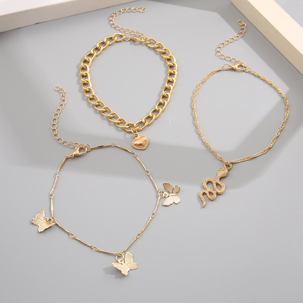 Damen Fußkettchen-Set mit floralen und kreativen Anhängern Shop Nory