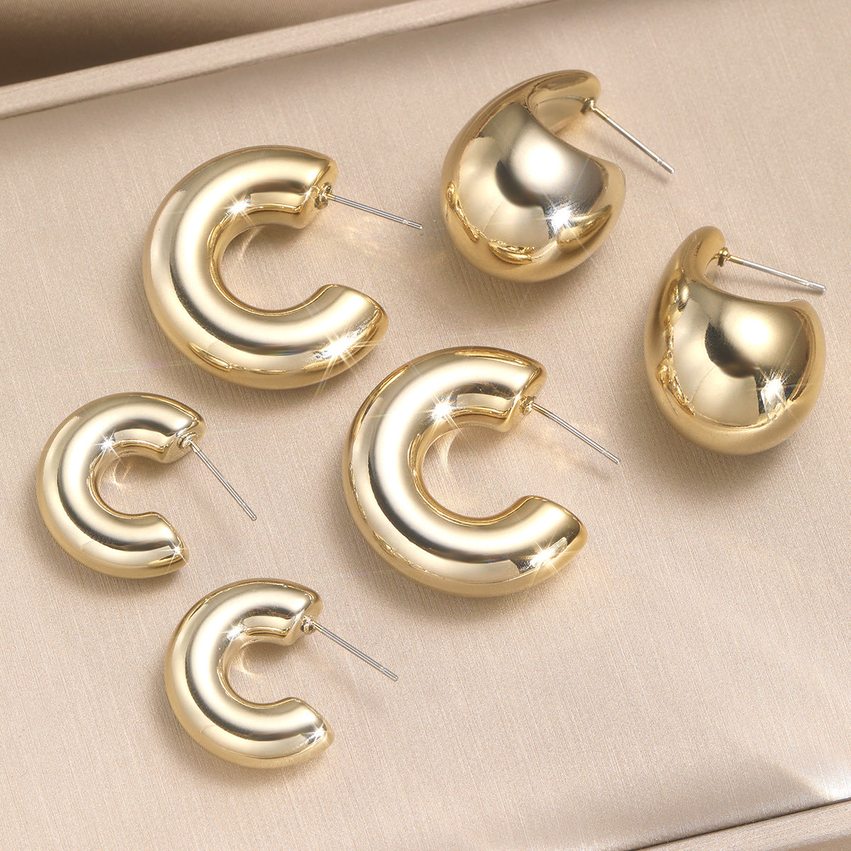 Damen skulptierte Modeschmuck-Ohrringe Shop Nory