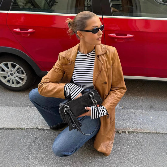 Damen Langer taillierter Leder‑Trenchcoat mit doppelreihiger Knopfleiste und Reverskragen Shop Nory