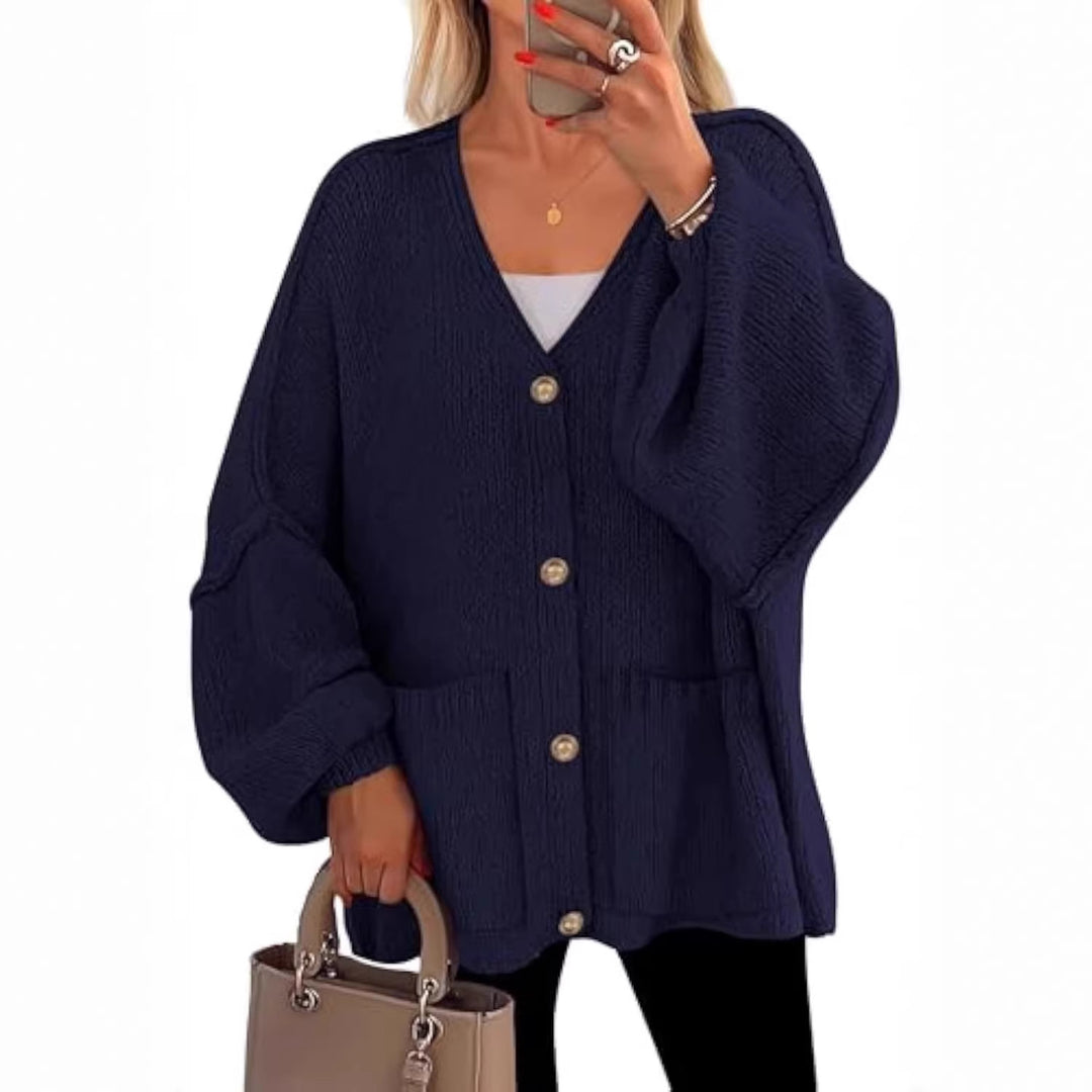 Damen Oversize Strickcardigan mit V-Ausschnitt, goldenen Zierknöpfen und aufgesetzten Taschen Shop Nory