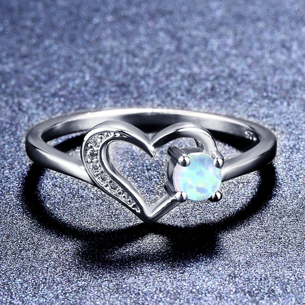 Damen Ring mit herzförmigem Design und funkelndem Opal Shop Nory