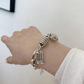 Damenarmband mit charmanten Anhängern Shop Nory