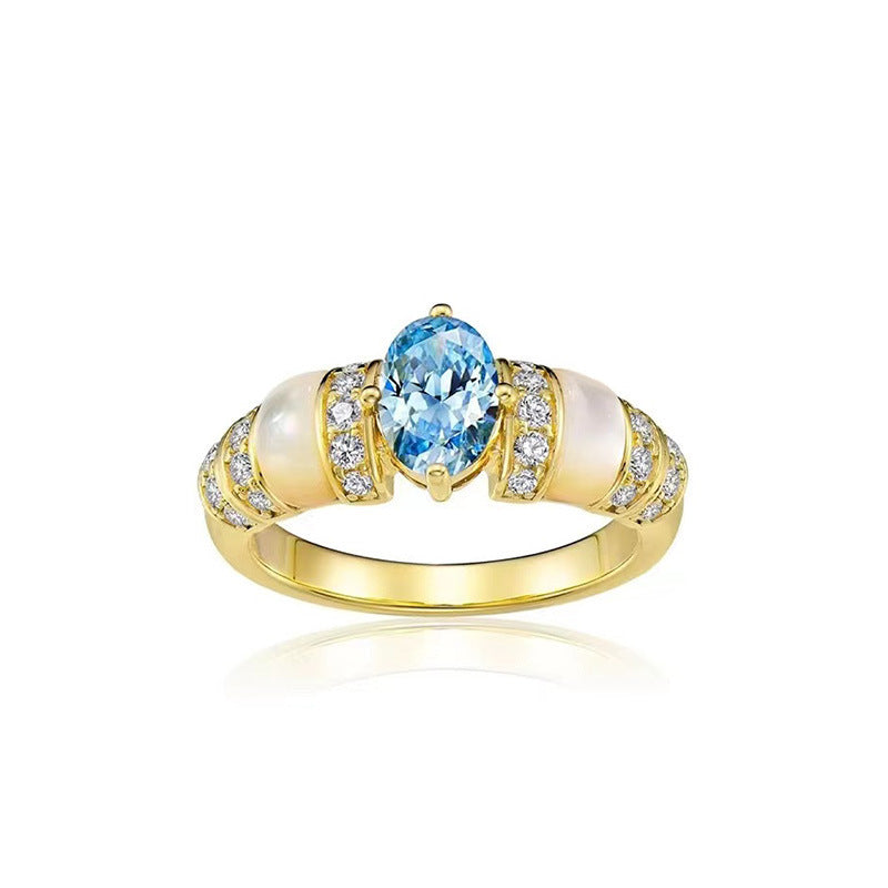 Damenring mit funkelndem Zirkonia und elegantem Perlmuttbesatz Shop Nory
